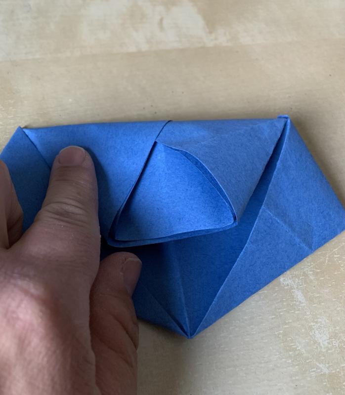 A photograph of the crease being made. The part folded in fit snugly.